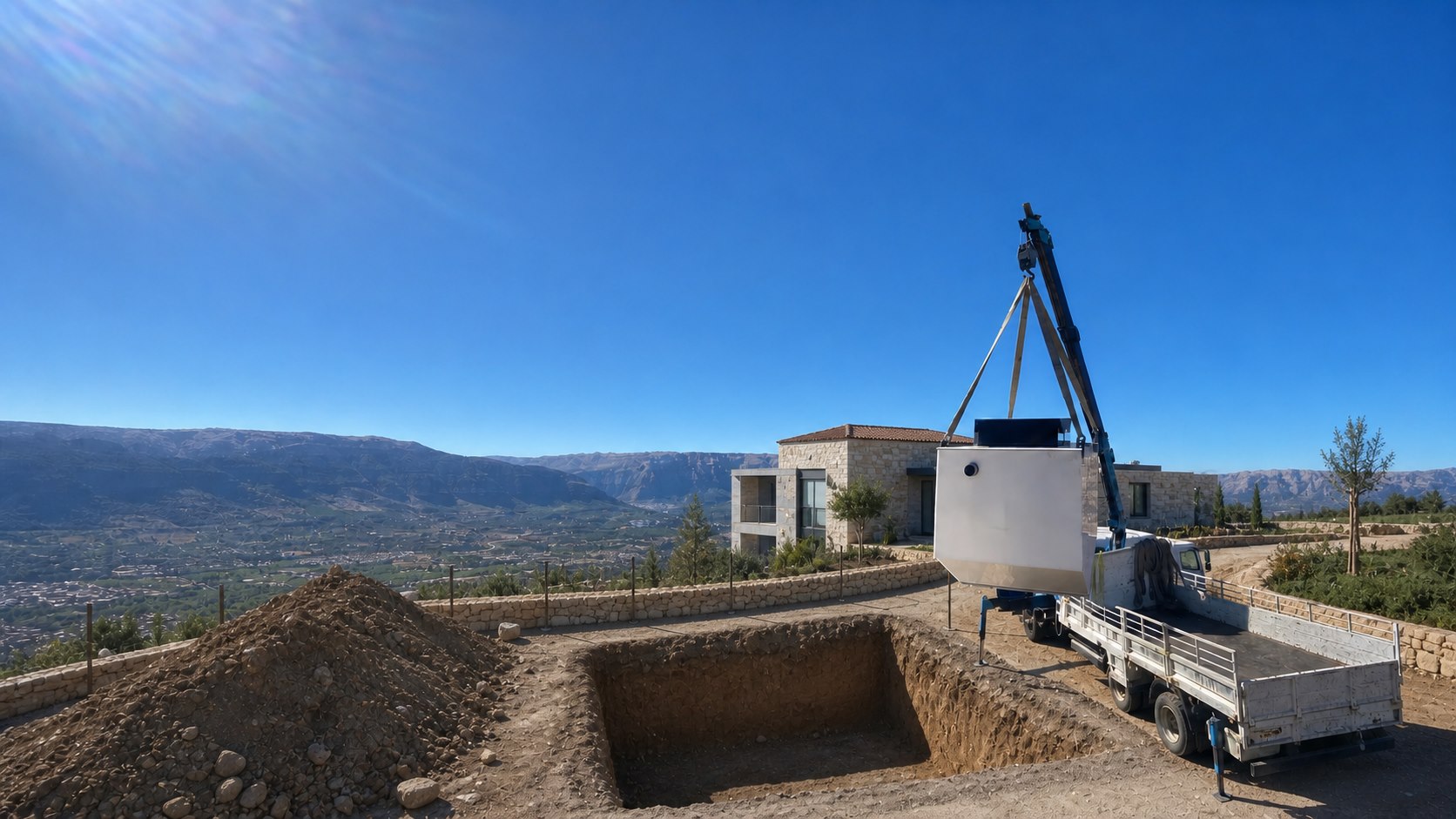 Hy-Series wastewater treatment plant being placed at a residential installation site